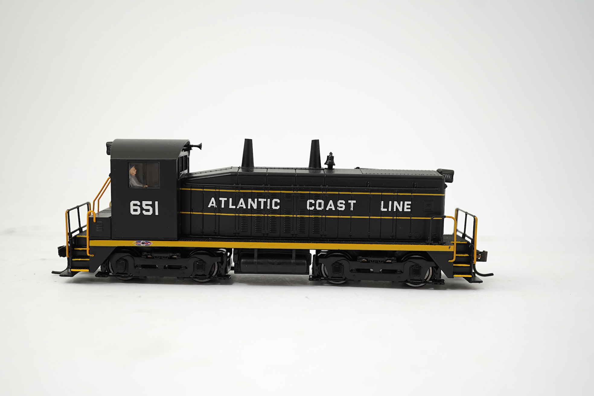 A boxed HO gauge Broadway Limited Paragon 2 Series (1215) model of Atlantic Coast Line, EMD SW7 Switcher PHII, 651, Bo-Bo diesel locomotive, powered for two rail operation.